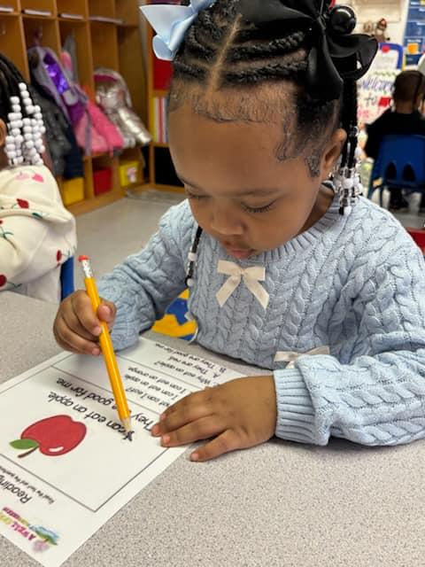 Children working on puzzles and hands-on learning materials