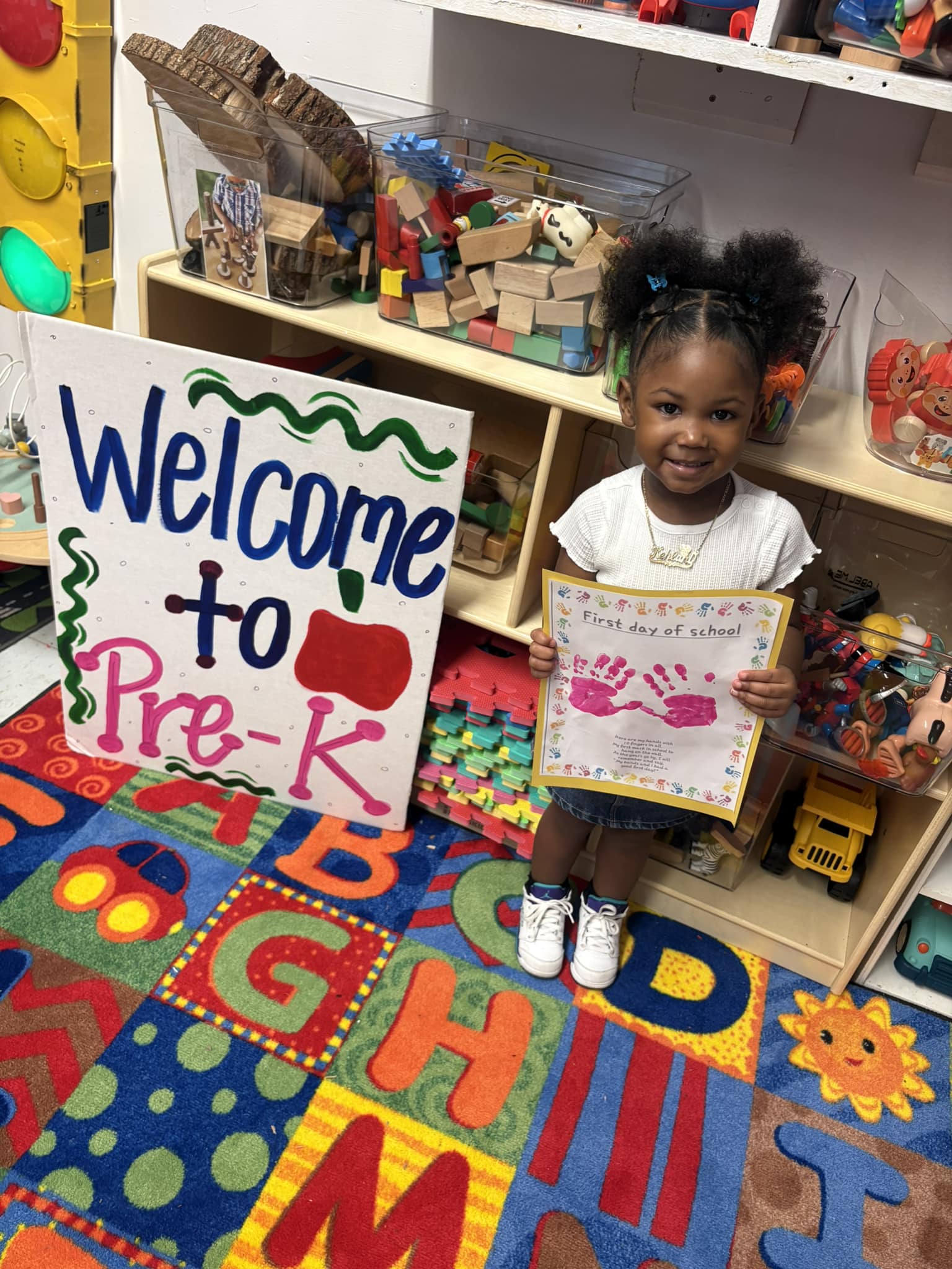 Preschool student celebrating welcome to Pre-K in the classroom